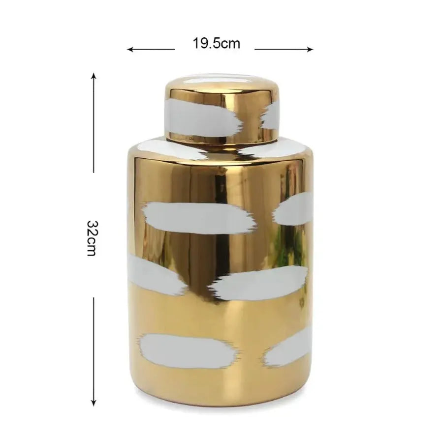 The Gold Porcelain Jar is an embodiment of elegance, marrying the timeless charm of porcelain with the lavish allure of gold. This exquisite decorative piece is a testament to meticulous craftsmanship,
